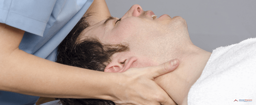 ACG-physiotherapist, chiropractor doing intraoral technique of massage masseter muscle